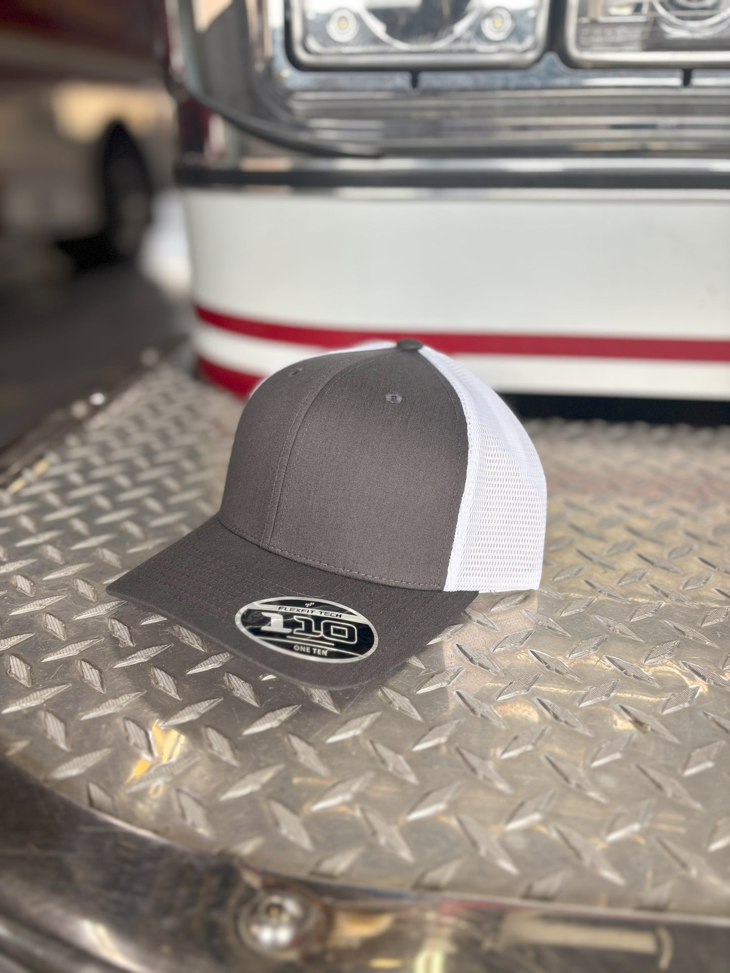 FLEXFIT 110® MESH CAP Trucker Mesh Back w/ Custom Fire Hose Patch (Charcoal/White)