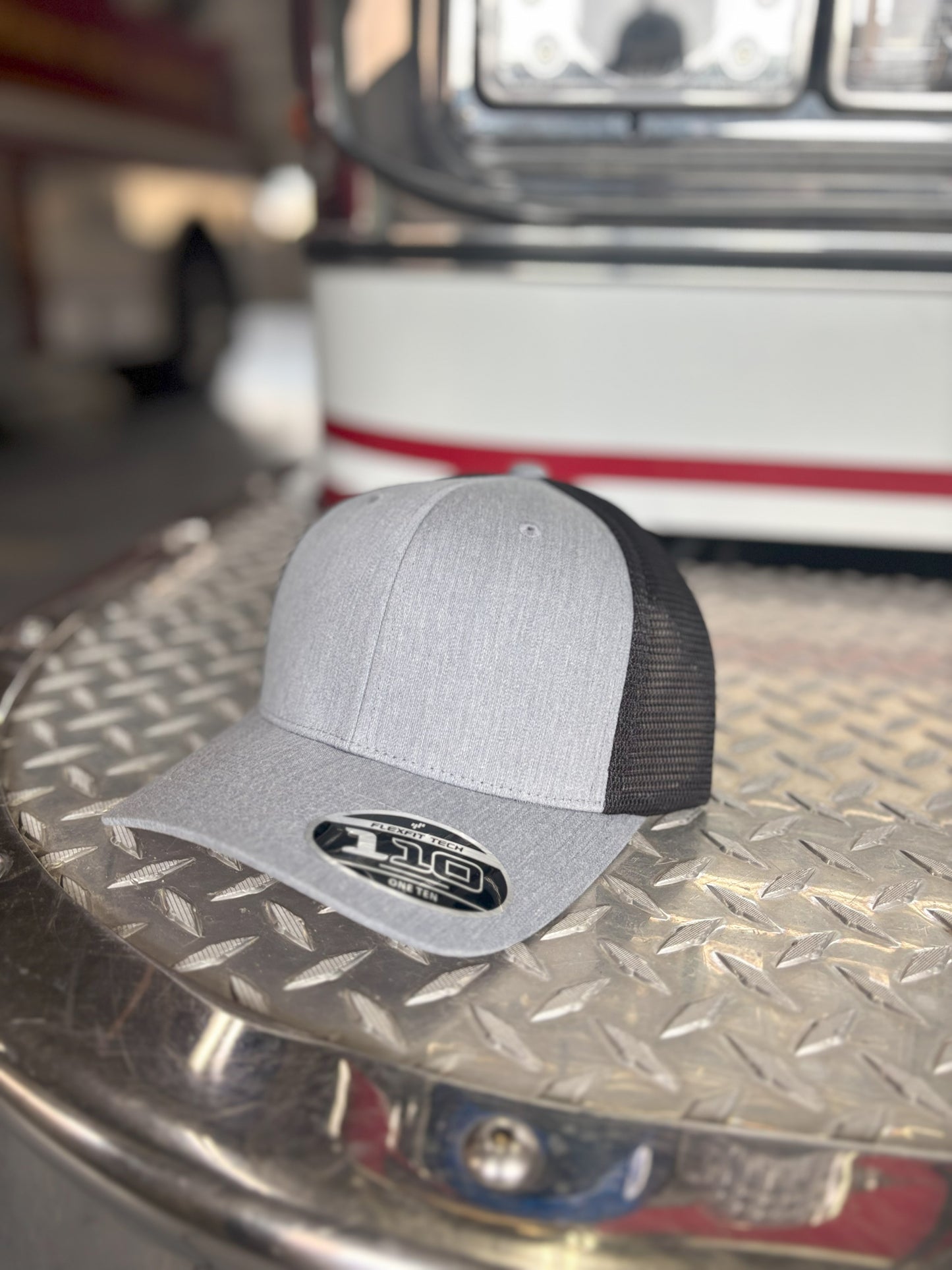 FLEXFIT 110® MESH CAP Trucker Mesh Back w/ Custom Fire Hose Patch (Heathergrey/Black)