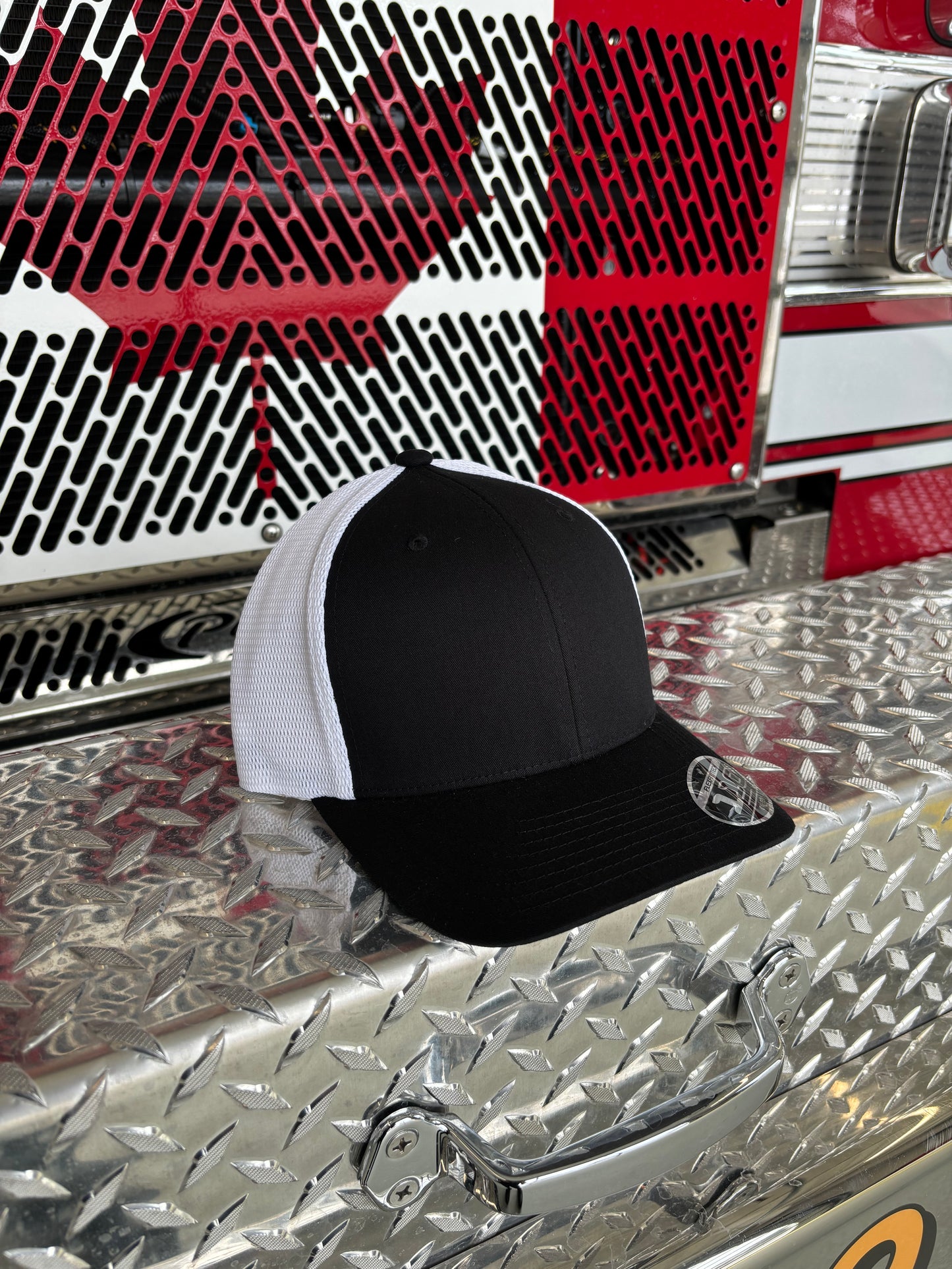 FLEXFIT 110® MESH CAP Trucker Mesh Back w/ Custom Fire Hose Patch (Black/white)